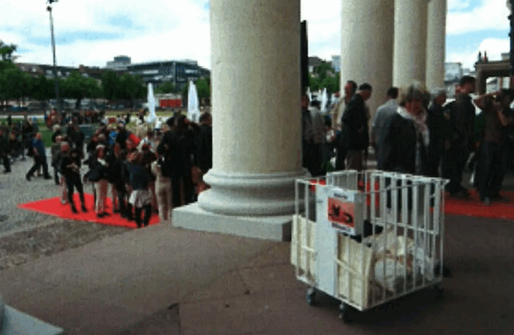Performed a live performance by actually living with her dog in the House Installation and performing to solicit donations for stray dogs in dOCUMENTA 13 at  Aue Park, Kassel, Germany
