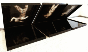 Created the artwork Three Boxes of Men and their Reflections